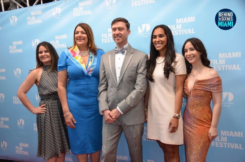 Festival faces: five smiles on the Miami Film Festival step-and-repeat.